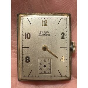 Vintage 1943 Elgin 558 17 jewel men's wrist watch movement with dial and crown‎